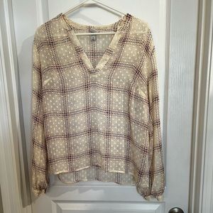 Vneck sheer blouse size medium with gold button at wrist